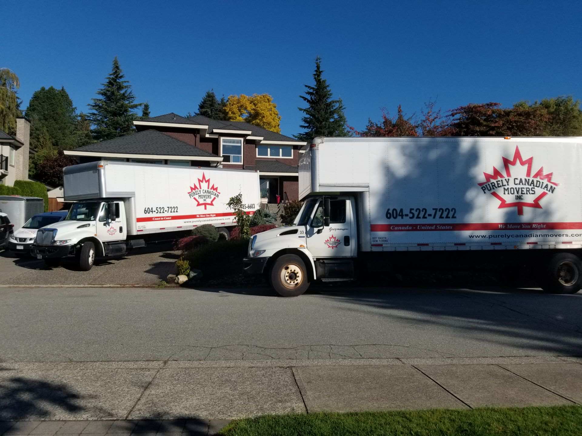 Purely Canadian Movers trucks